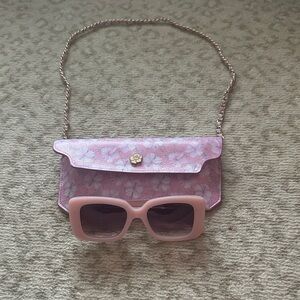 LoveShackFancy sunglasses and purse